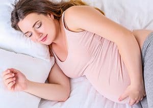 BCOH Sleep and Pregnancy Blog - Pregnant Woman trying to sleep